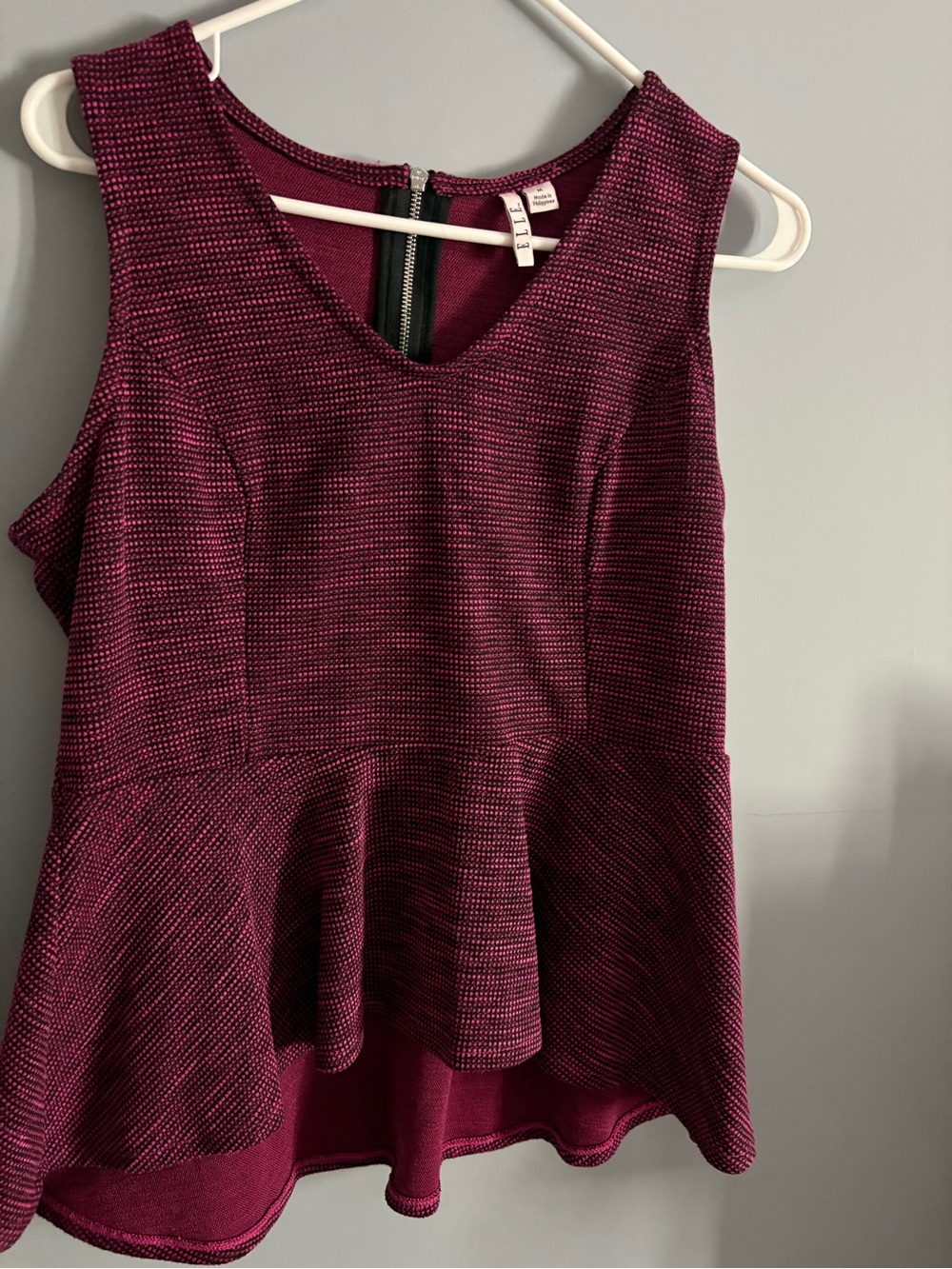 Elle Sleeveless Peplum Top in Deep Plum